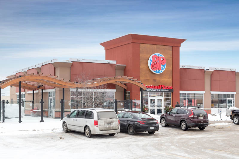 commercial real estate photo of a restaurant against a blue sky