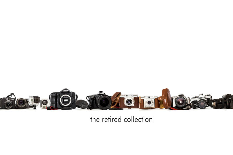 collection of mostly retired cameras, including some antiques