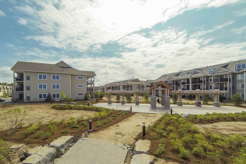 Elevated viewpoint of a new condominium complex without using a drone