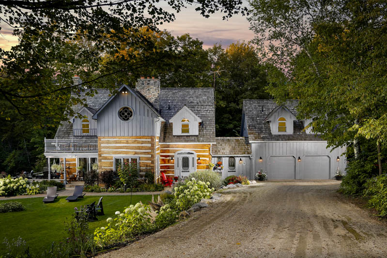 a twilight photo of a house at night with professional lighting