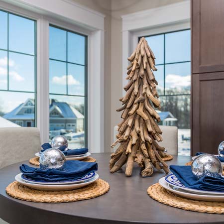 Close up view of a table setting in winter with a holiday theme