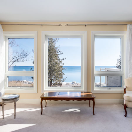 Living room with a view of the water on Georgian Bay
