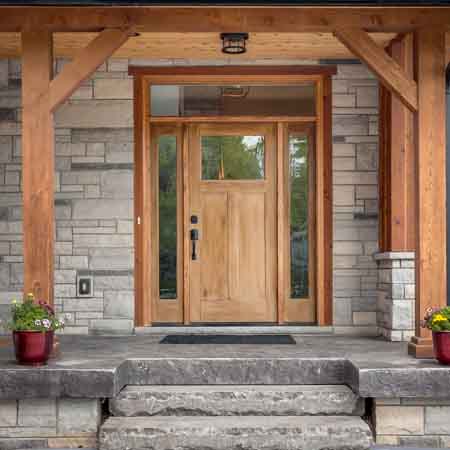 large wooden front door square perspective with camera