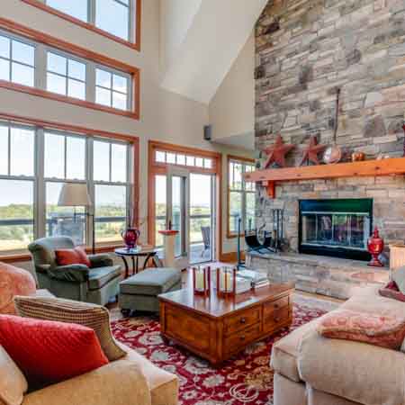 Large living room with stone fireplace