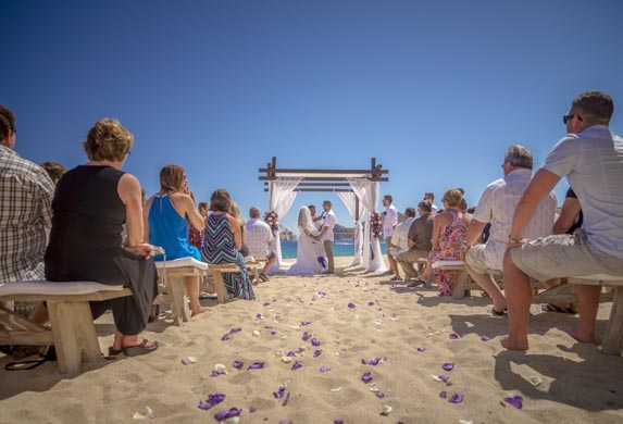 View down the aisle of a wedding on the beach in Mexico by Chris Gardiner Photography www.cgardiner.ca